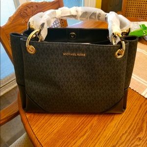 Brand new. Just not how I pictured it but perfect condition.